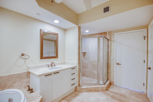 full bathroom with ceiling fan, recessed lighting, vanity, visible vents, and a shower stall