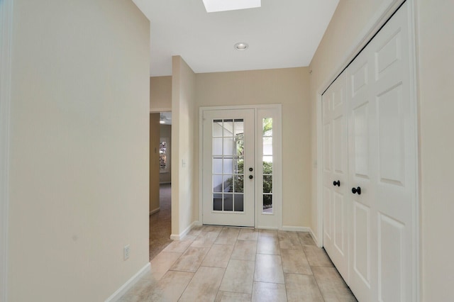 foyer with light tile patterned floors