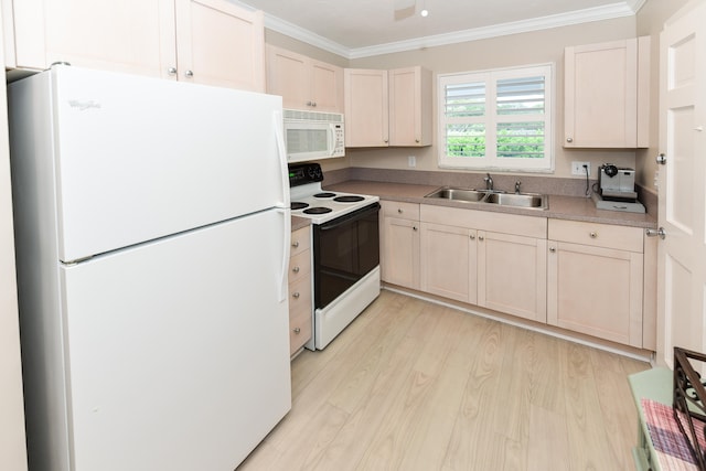 kitchen featuring white appliances, sink, ornamental molding, and light hardwood / wood-style flooring