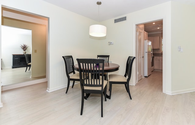 dining area featuring light hardwood / wood-style floors