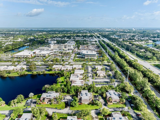 drone / aerial view with a water view