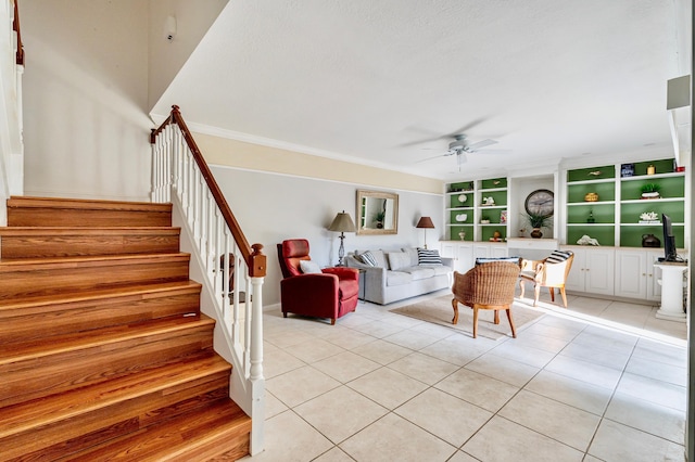 dining space featuring light tile patterned floors and ceiling fan