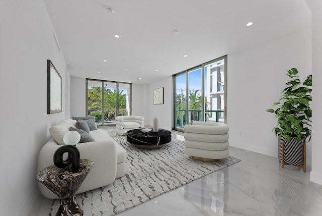 485 E Royal Palm Rd Unit 204, Boca Raton, FL 33432 - living area featuring a wall of windows, recessed lighting, and marble tiled floors