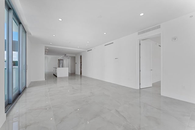 485 E Royal Palm Rd Unit 204, Boca Raton, FL 33432 - unfurnished room featuring recessed lighting and light marble finish floors