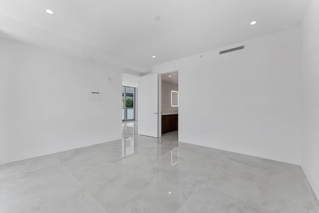 485 E Royal Palm Rd Unit 204, Boca Raton, FL 33432 - unfurnished room with recessed lighting and light marble finish floors