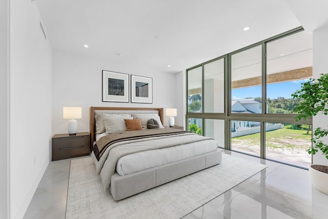 485 E Royal Palm Rd Unit 204, Boca Raton, FL 33432 - bedroom with a wall of windows and recessed lighting