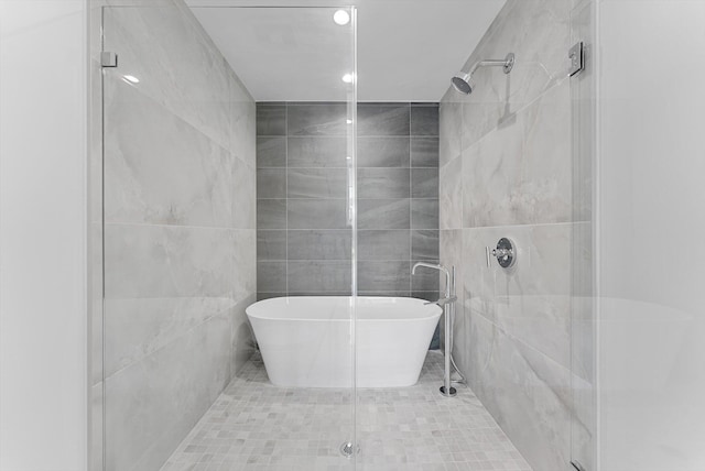 485 E Royal Palm Rd Unit 204, Boca Raton, FL 33432 - full bathroom with a stall shower, tile walls, recessed lighting, and a soaking tub
