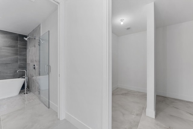 485 E Royal Palm Rd Unit 204, Boca Raton, FL 33432 - bathroom with a shower stall, a freestanding tub, and baseboards