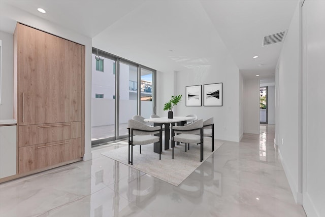 485 E Royal Palm Rd Unit 204, Boca Raton, FL 33432 - dining area with light marble finish floors, recessed lighting, and baseboards