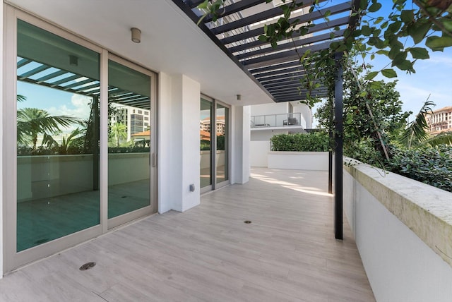 485 E Royal Palm Rd Unit 204, Boca Raton, FL 33432 - wooden deck featuring a pergola