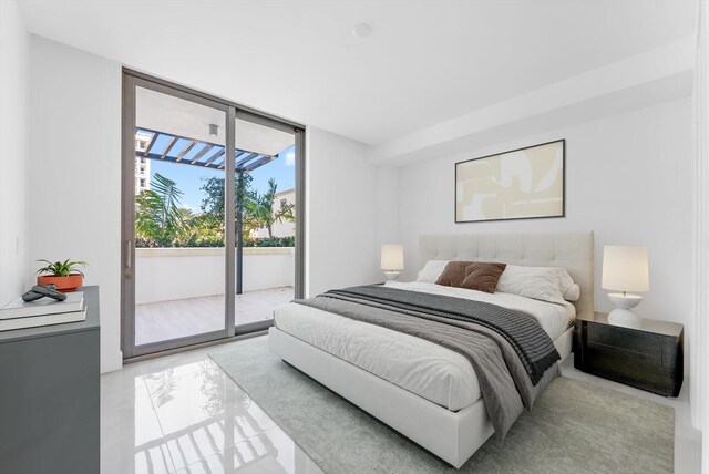 485 E Royal Palm Rd Unit 204, Boca Raton, FL 33432 - bedroom with access to outside and a wall of windows