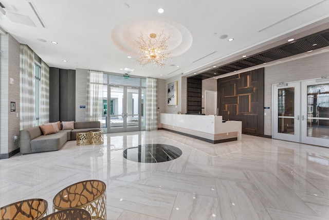 485 E Royal Palm Rd Unit 204, Boca Raton, FL 33432 - reception featuring french doors, a chandelier, and recessed lighting