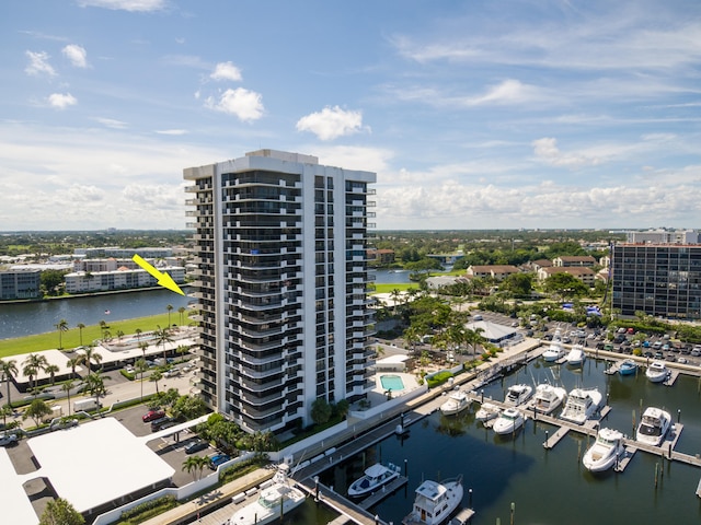 birds eye view of property with a water view