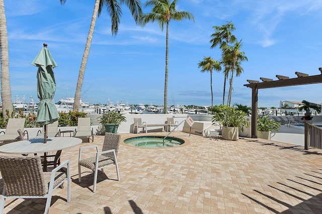 view of patio featuring a community hot tub