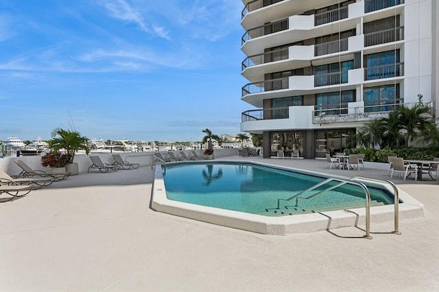 view of pool with a patio area