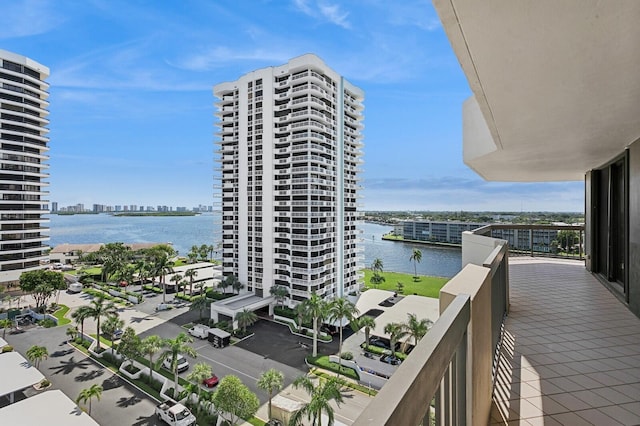 balcony featuring a water view