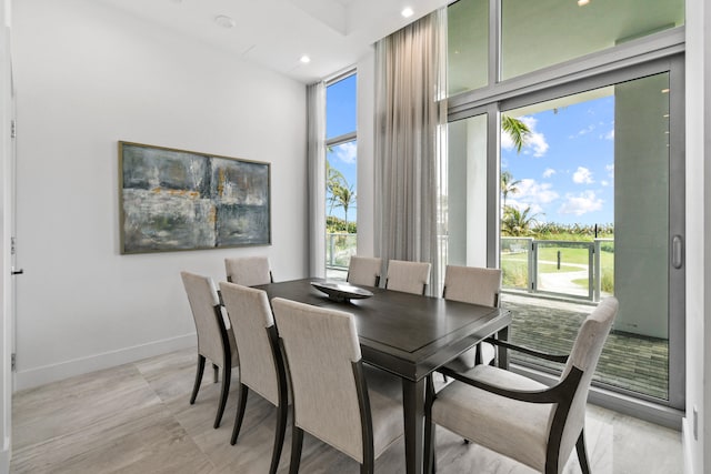 dining area featuring expansive windows