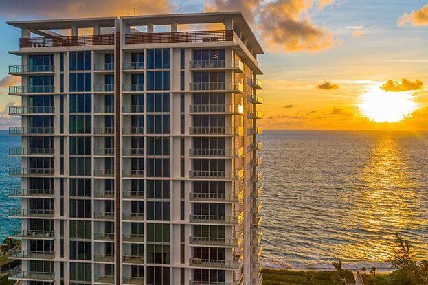 outdoor building at dusk featuring a water view