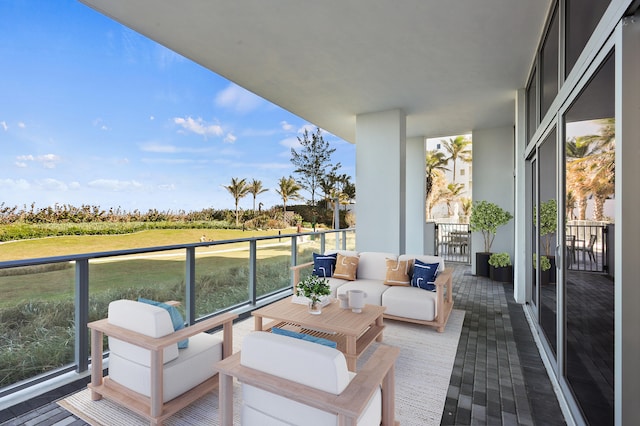 balcony featuring outdoor lounge area