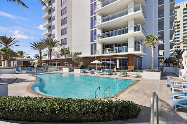pool with a patio area