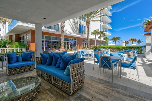 view of patio featuring outdoor lounge area and outdoor dining space