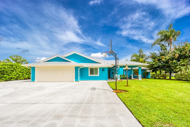 ranch-style home with a front yard and a garage