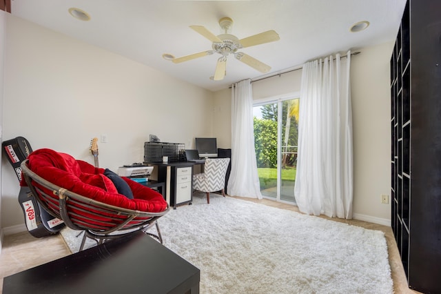 1121 SW Pine Tree Ln, Palm City, FL 34990 - home office featuring a ceiling fan and baseboards
