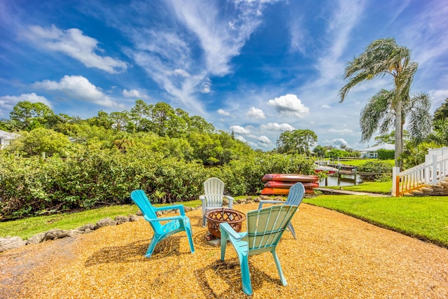 1121 SW Pine Tree Ln, Palm City, FL 34990 - view of yard with a fire pit
