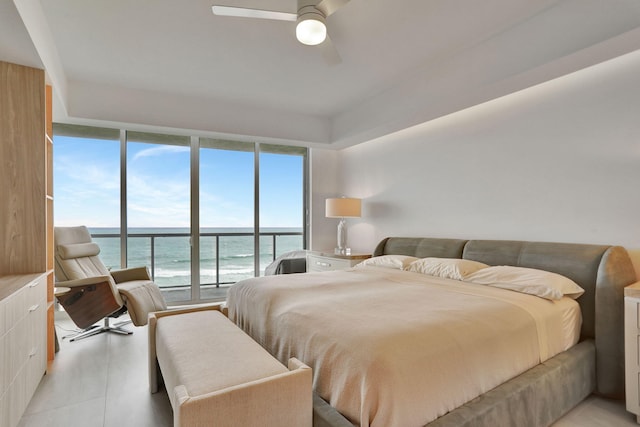 704 N Ocean Blvd Unit 602, Pompano Beach, FL 33062 - bedroom featuring a water view, access to exterior, expansive windows, and ceiling fan