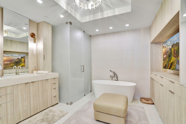 704 N Ocean Blvd Unit 602, Pompano Beach, FL 33062 - full bath featuring vanity, a freestanding tub, recessed lighting, a stall shower, and tile walls
