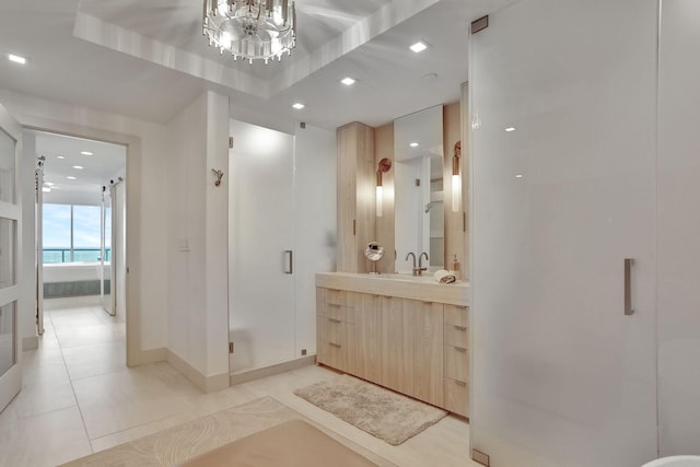 704 N Ocean Blvd Unit 602, Pompano Beach, FL 33062 - bathroom featuring vanity, a shower stall, recessed lighting, baseboards, and tile patterned floors