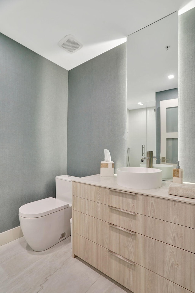 704 N Ocean Blvd Unit 602, Pompano Beach, FL 33062 - bathroom with toilet and vanity