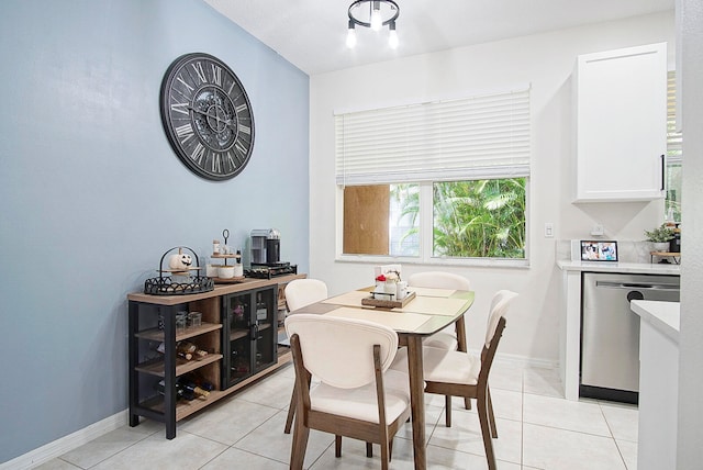 dining space with light tile patterned floors