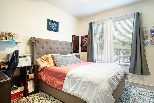 bedroom with light wood-type flooring