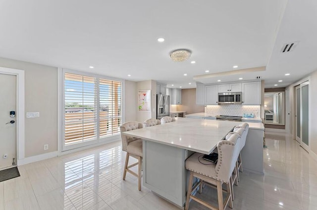 dining space with light tile patterned flooring