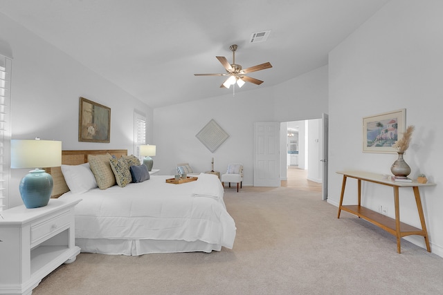 carpeted bedroom featuring ceiling fan and lofted ceiling