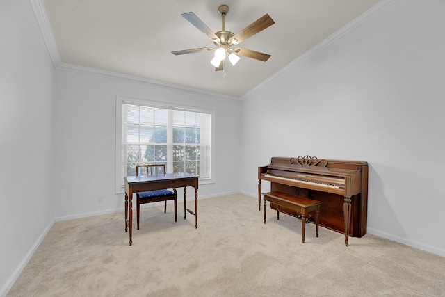 office area featuring light carpet, ceiling fan, and ornamental molding