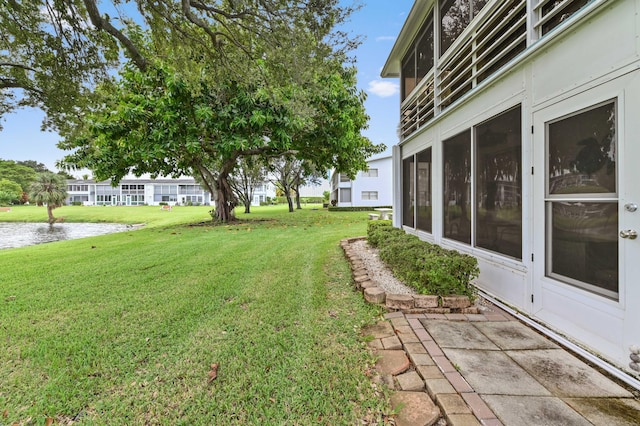 view of yard with a sunroom