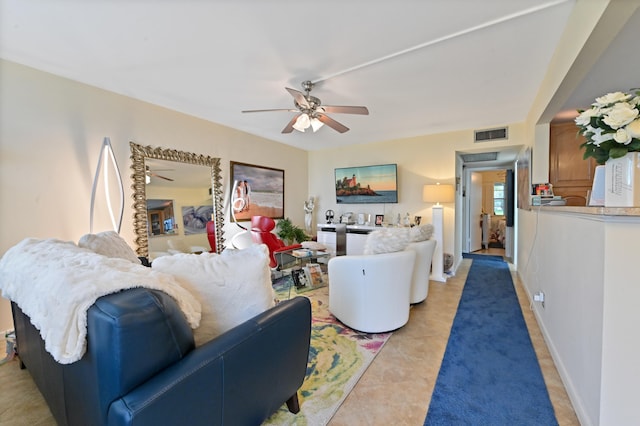 living room with ceiling fan