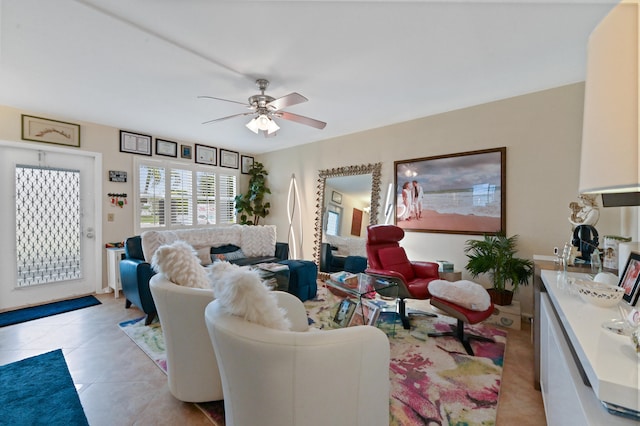 tiled living room featuring ceiling fan