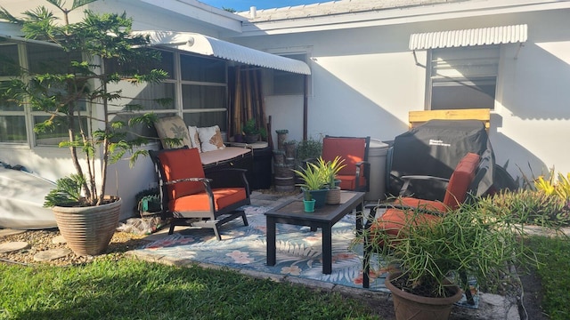 view of patio with a grill