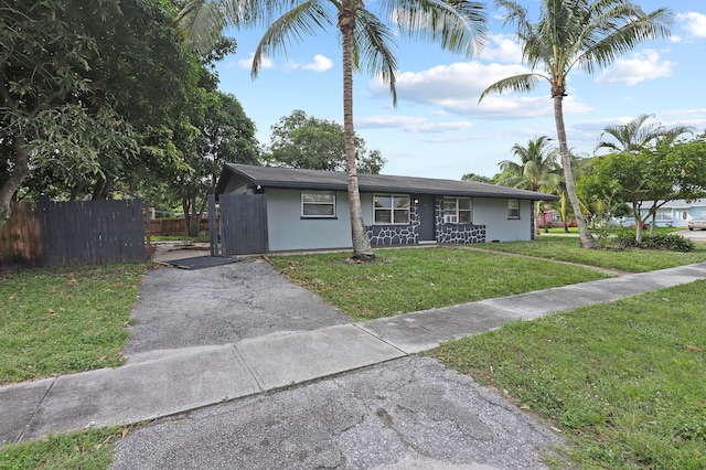 ranch-style house with a front yard