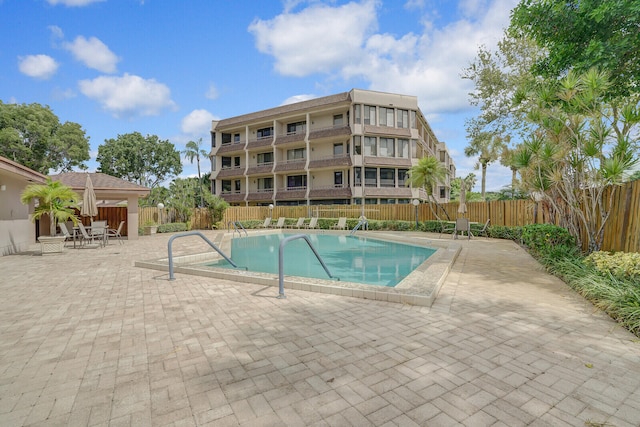 view of pool featuring a patio area