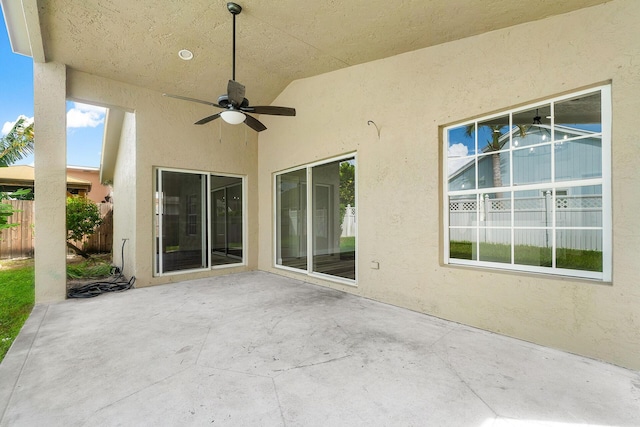 view of patio featuring ceiling fan