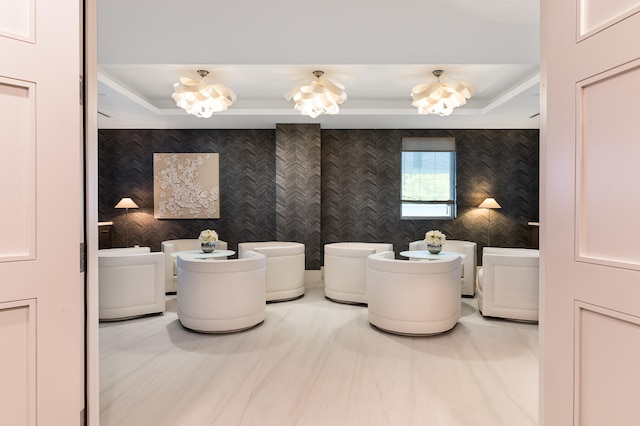 bathroom featuring a chandelier, a raised ceiling, and toilet