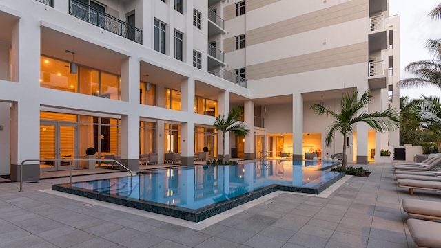 view of swimming pool featuring a patio