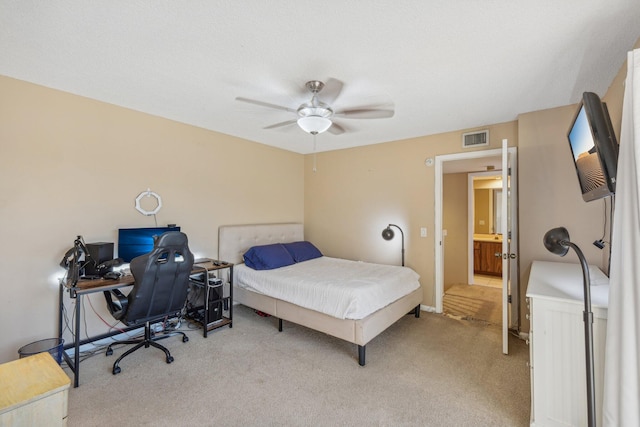 bedroom featuring light carpet and ceiling fan