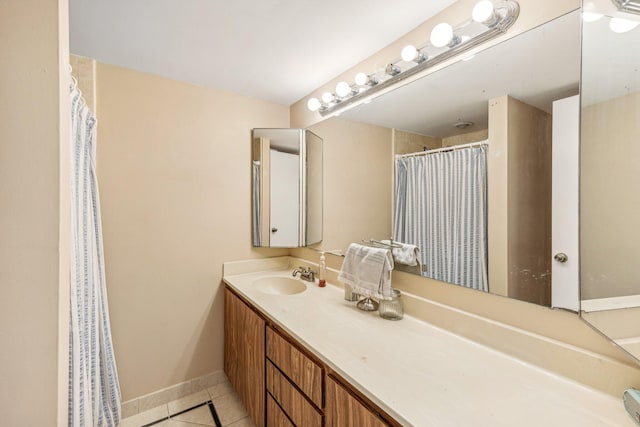 bathroom with vanity and tile patterned floors