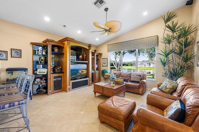 living room with vaulted ceiling and ceiling fan