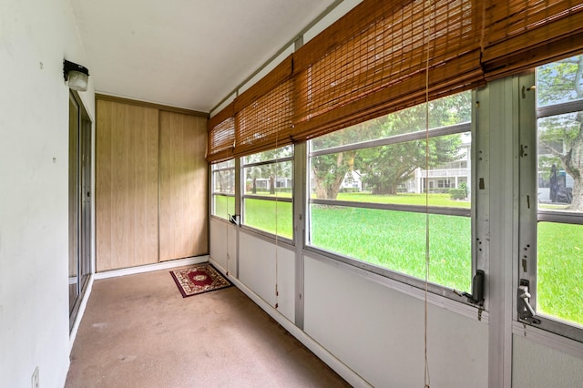 unfurnished sunroom featuring a wealth of natural light